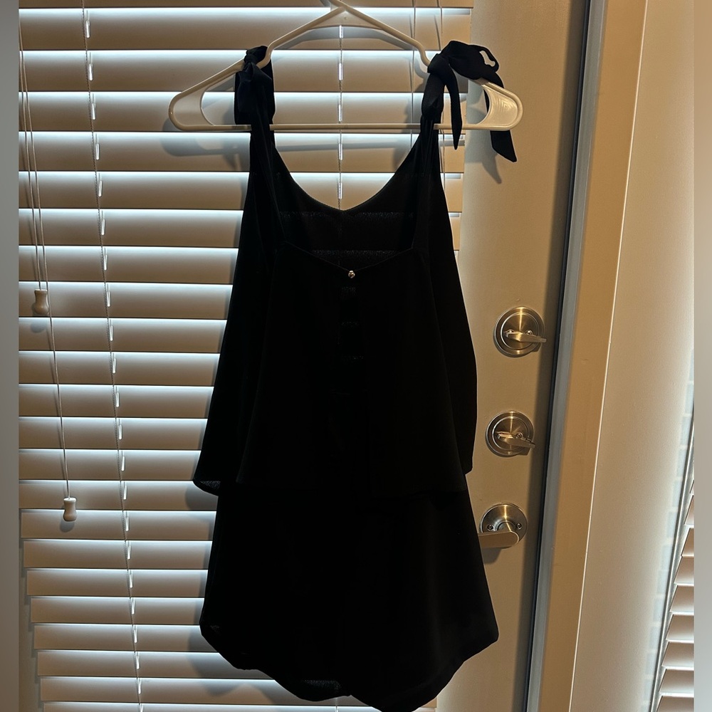 Super cute romper with bows, great material